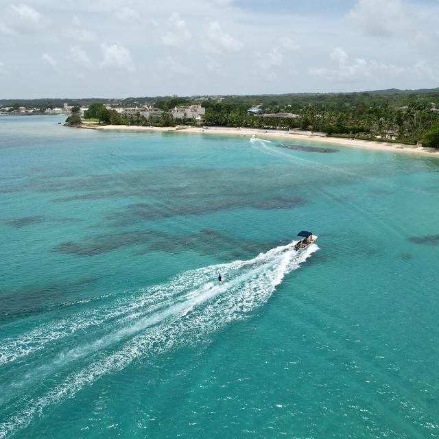 Speedboat over turquoise water