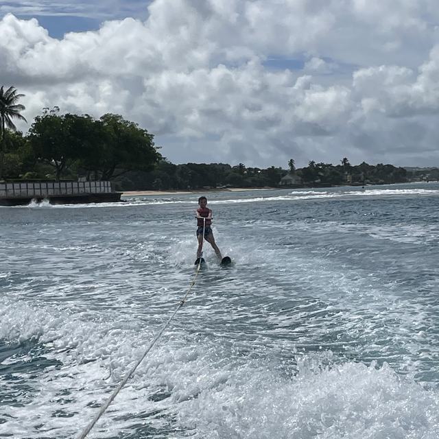 Water-skier behind the boat